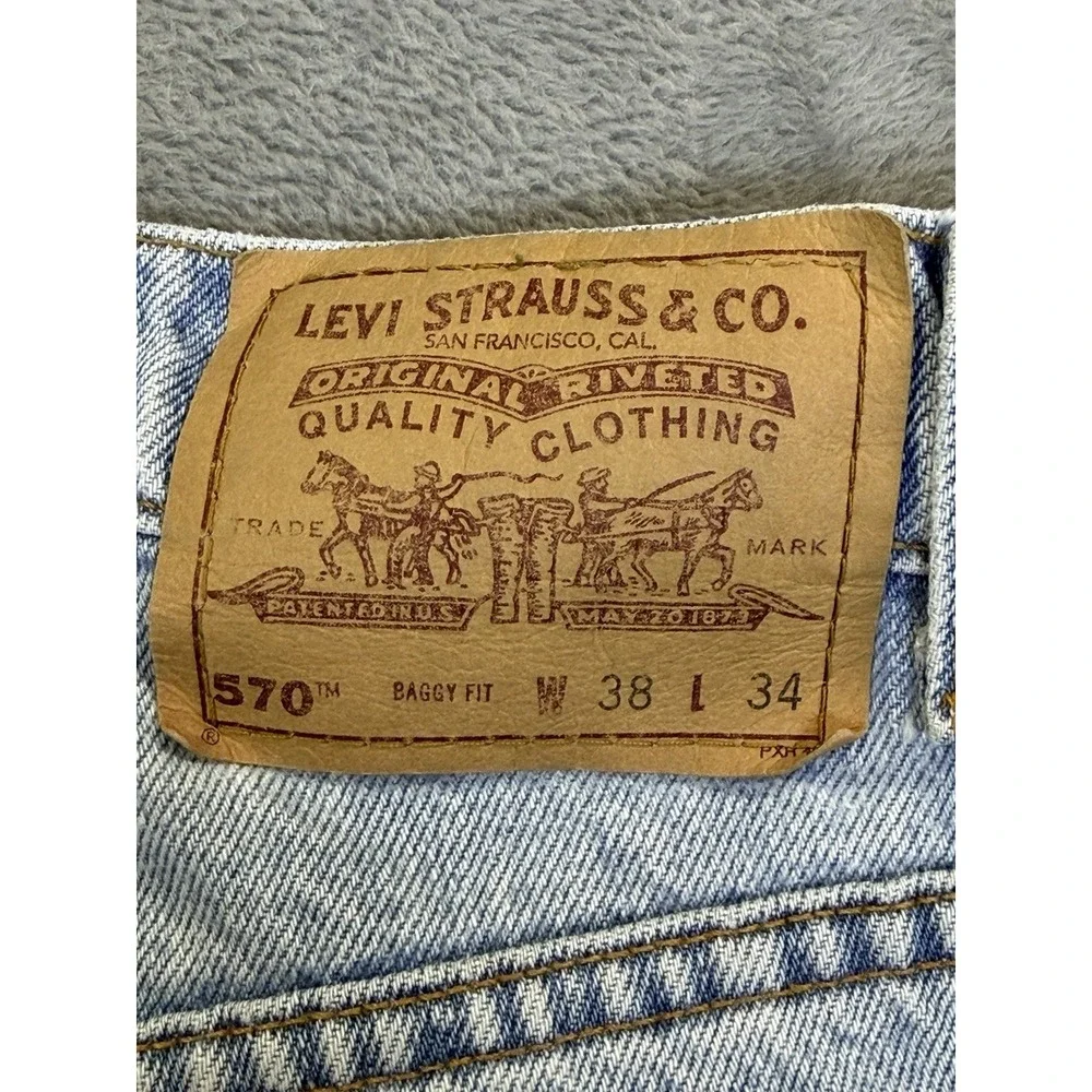 Vintage Levis Jeans Mens 38x34 Blue Light Wash 570 Taper Baggy Made‎ In USA 90s